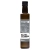 Ciemna butelka 500 ml Oleju MCT C8 Nanovital z kokosów, idealnego do diety keto, z czytelną etykietą.
